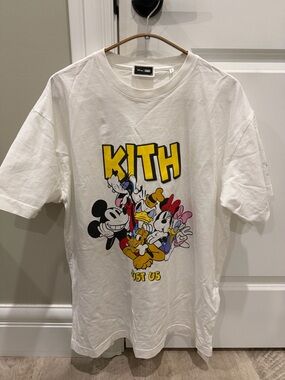 Kith White Graphic Tee with Yellow Logo and Multicolor Disney Print